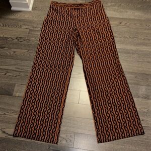 Stylish Black and Orange monogram Patterned women Pants